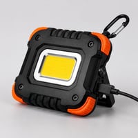 Mini linterna de trabajo COB negra y naranja con cable USB, pie plegable e imán trasero
