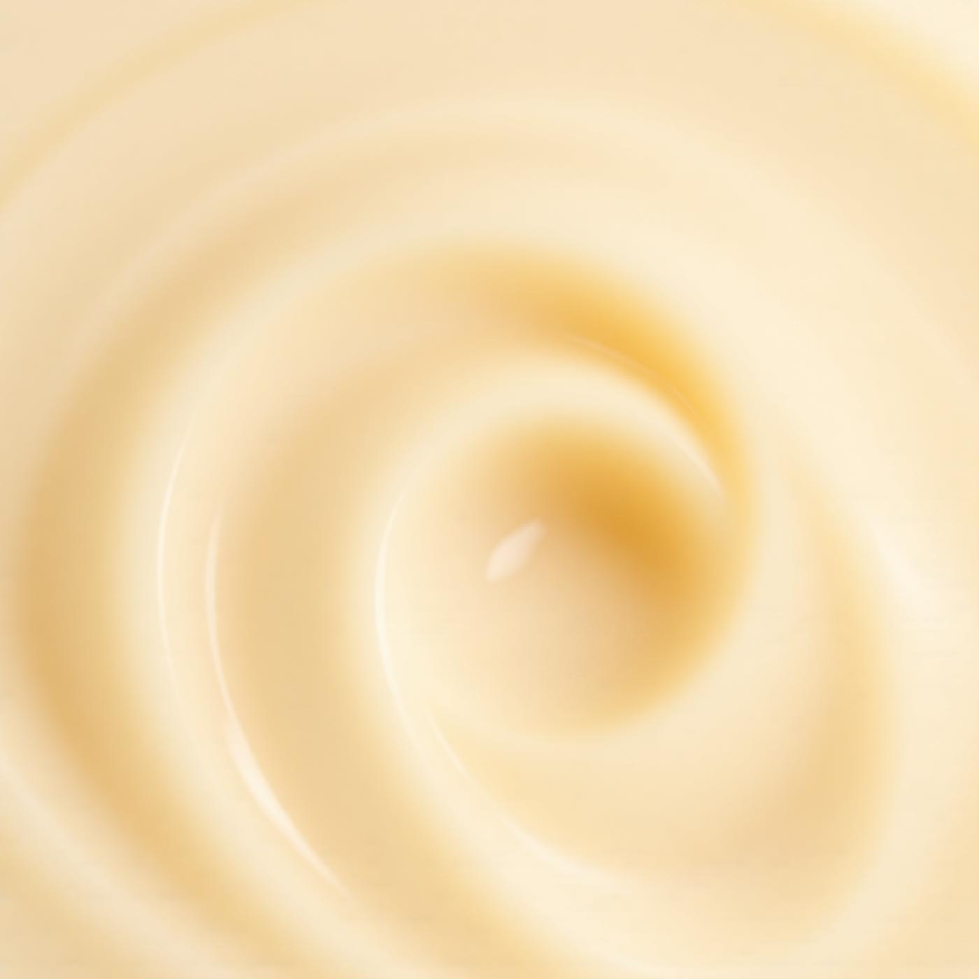 Macro de la textura cremosa del bálsamo facial multifuncional