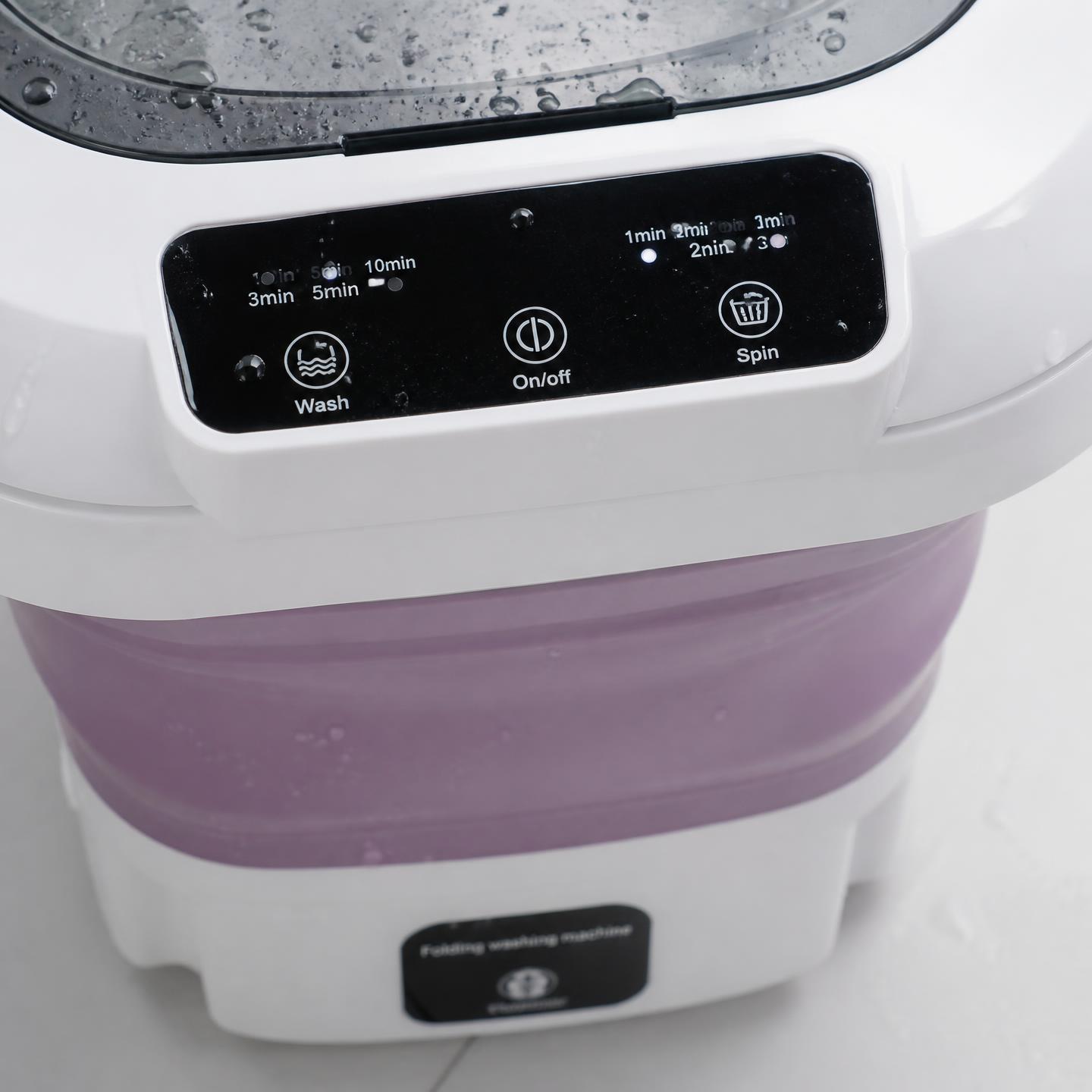 Detalle del panel de control táctil de la mini lavadora portátil